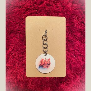 Vedh�ng til n�glering 