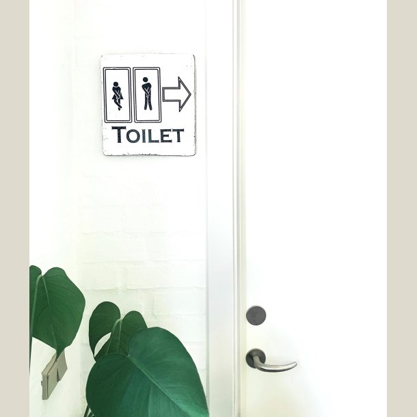 Skilt "Toilet" sort/hvid m. pil